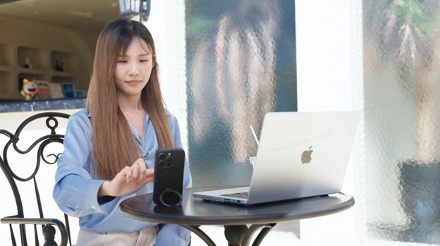 iphone-17-stand-case-supporting-hands-free-zoom-call-beside-laptop