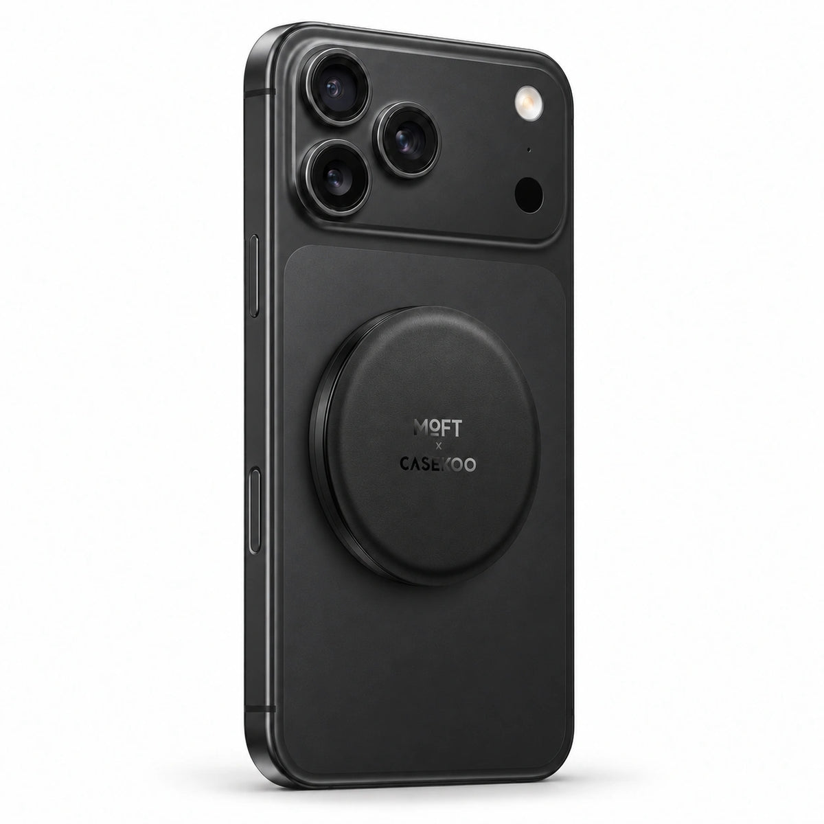 Black MOFT × CASEKOO stand on a black iPhone