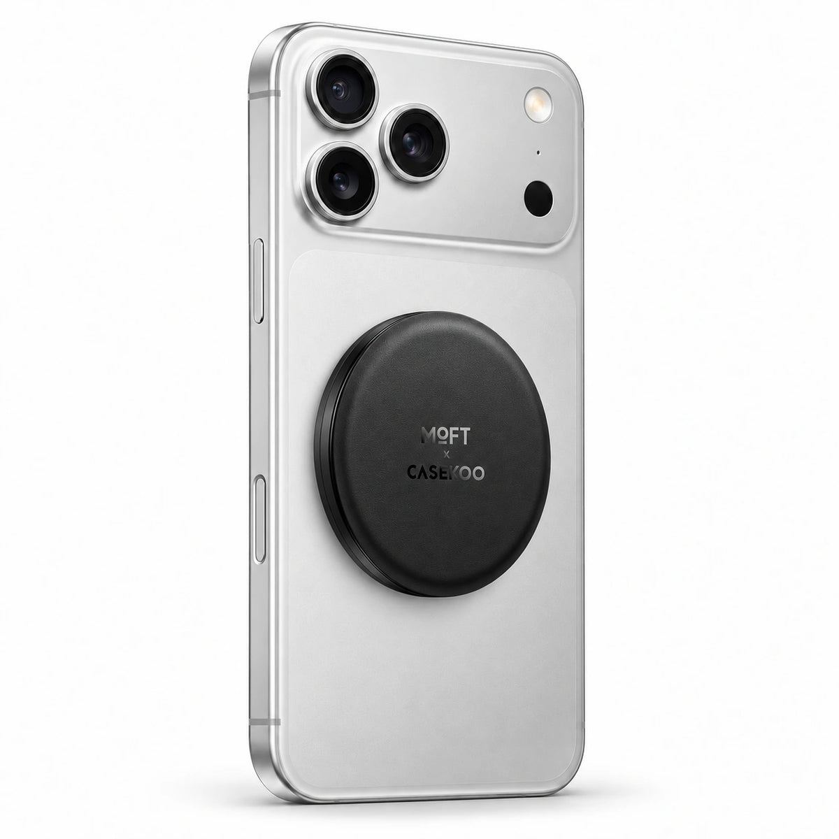 Black MOFT × CASEKOO stand on a silver iPhone