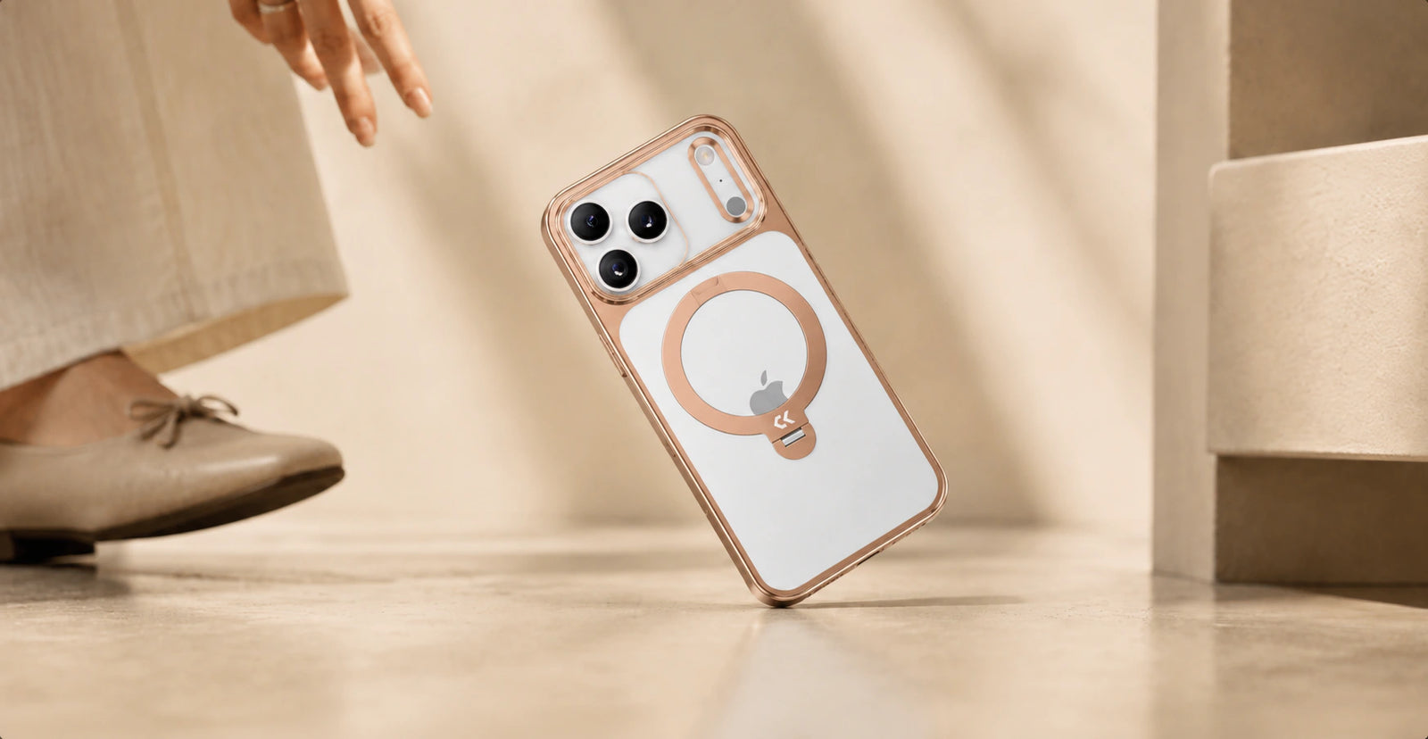 CASEKOO StandKOO Halo case balanced above the floor to illustrate drop protection