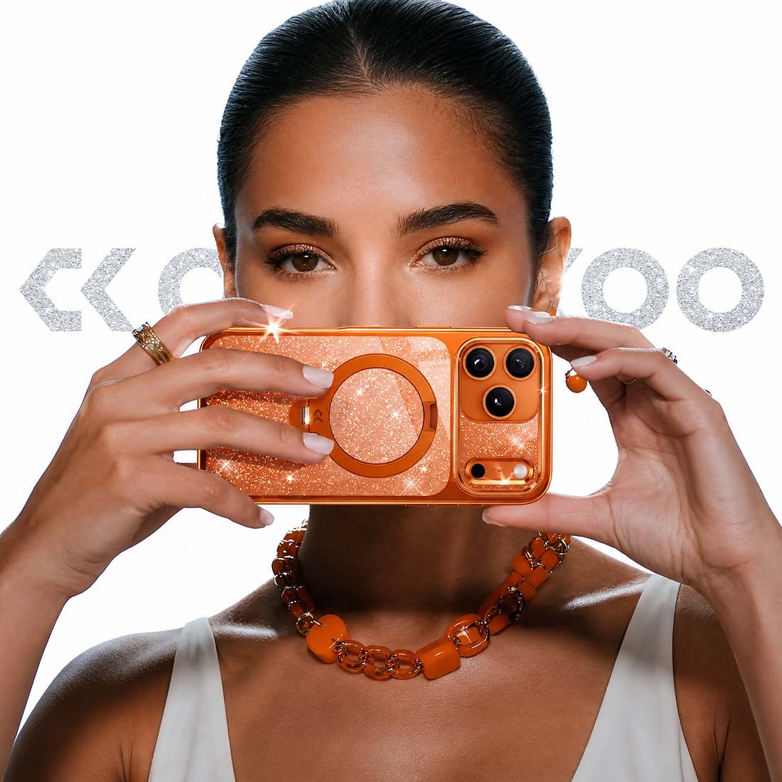 Model holding a Vivid Orange StandKOO Glitter case